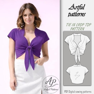 Peut inclure: Une femme porte un haut court violet à nouer et une jupe blanche. Le haut a des manches courtes et un col en V profond. L'image comprend également un graphique du haut et le texte "Artful patterns" et "TIE IN CROP TOP PATTERN".