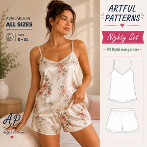 May include: A satin nighty set featuring a camisole top with thin straps and matching shorts, both decorated with a floral pattern of pink roses and green leaves. The image includes text reading ARTFUL PATTERNS Nighty Set and a line drawing.