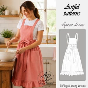 Peut inclure: Une robe tablier corail avec un nœud à la taille et des poches. Le tablier a un ourlet à volants et est porté sur un t-shirt blanc. Le texte "Artful patterns" et "Apron dress" est visible. Le logo "AP Artful Patterns" est également présent.