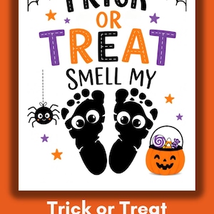 May include: A white rectangular sign featuring the black text TRICK OR TREAT SMELL MY. Below the text are two black footprints with white eyes, a small black spider hanging from a web, and an orange jack-o'-lantern bucket filled with candy.