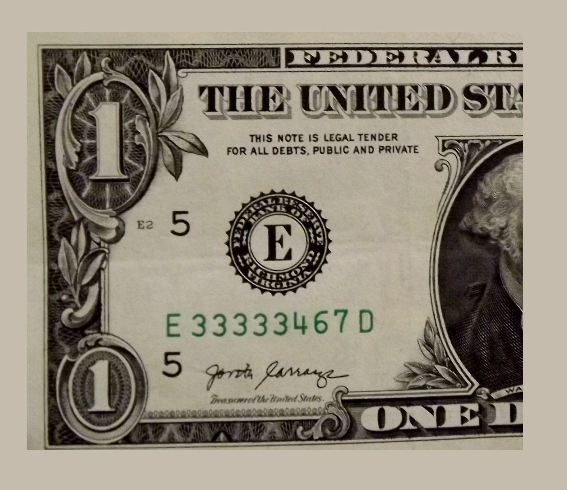 A One Dollar Bill Has A Serial Number With 5 Connective 3's. Item 890