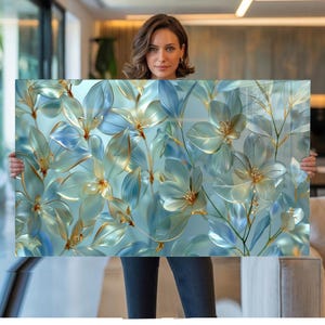 May include: A set of three ceramic mugs with a speckled, matte finish. The mugs are in shades of cream, light gray, and dark gray. Each mug has a simple, minimalist design, perfect for coffee or tea.