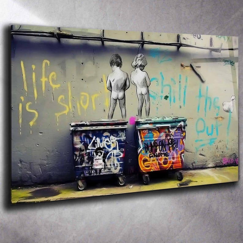 Tempered Glass Wall Art featuring two children above colorful graffiti-covered dumpsters against a distressed urban wall with bold yellow and turquoise writing. Urban Street Art ideal for industrial, loft and contemporary interiors.