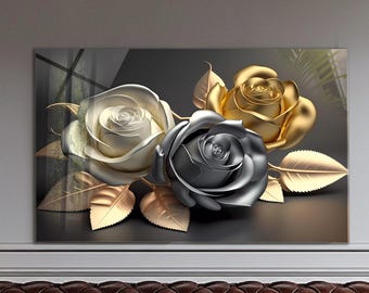 May include: A framed artwork featuring three dimensional roses. The roses are in shades of white, silver, and gold, with matching gold leaves. The background is a dark gray, creating a striking contrast.
