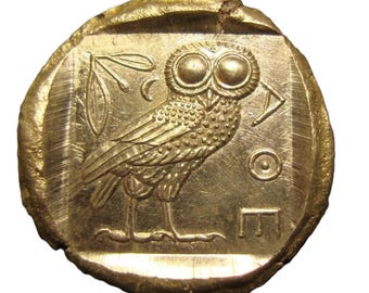 Riproduzione di un tetradramma ateniese (450 a.C.), raffigurante la Civetta di Atena