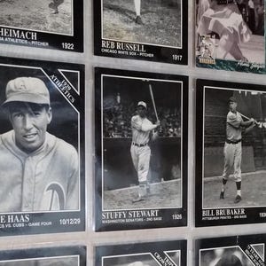 May include: A collection of vintage baseball cards featuring black and white photos of baseball players from the early 1900s. The cards feature the players' names, team names, and years. The cards are in good condition and would be a great addition to any baseball fan's collection.