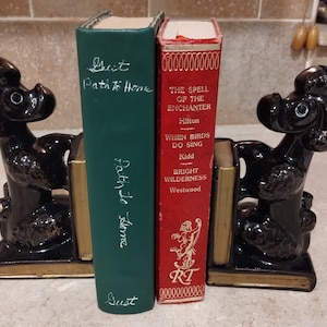 Mid century ceramic poodle book ends with Two FREE BOOKS..
