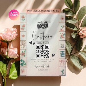 Könnte beinhalten: Ein druckbares Schild mit dem Text "Capture the Fun!" und einem QR-Code. Das Schild enthält eine Kamera-Illustration und den Text "Teilen Sie Ihre Fotos mit uns! Scannen Sie einfach den QR-Code." Das Schild ist 12,7x17,8 cm & 20,3x25,4 cm groß.
