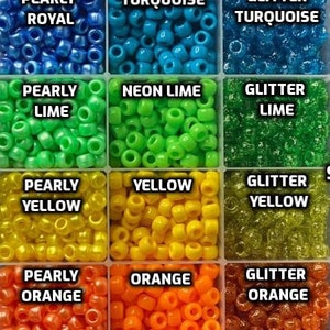 May include: A set of 12 containers filled with colorful plastic beads. The beads are labeled with different colors and finishes, including pearly purple, turquoise, neon lime, yellow, orange, and hot pink.
