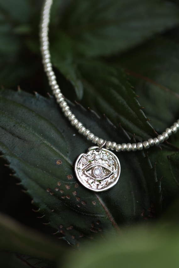 Sterling silver evil eye pendant necklace