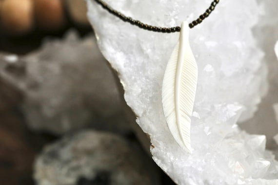 Bone carved feather and bead necklace