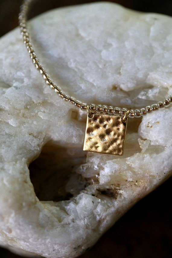 Yellow gold over sterling silver hammered square charm necklace