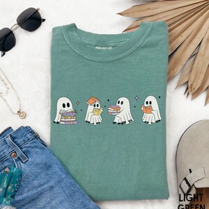 Retro ghost reading book t-shirt, Bookish Halloween shirt, Book lover gift, Cute bookish ghost tee, Teacher ghost crewneck, Gift for reader