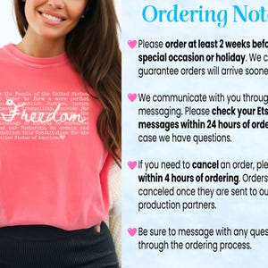 May include: Coral-colored t-shirt with the word "Freedom" in a cursive font, and text from the U.S. Constitution. The shirt also has the text "Ordering Notes" and other ordering information.