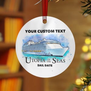 May include: A white, round ornament with a red ribbon. The ornament features a cruise ship design with the text "YOUR CUSTOM TEXT", "UTOPIA OF THE SEAS", and "SAIL DATE". The ship is blue and white.