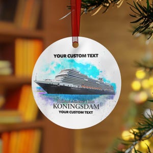 May include: A round white Christmas ornament with a red ribbon. The ornament features a cruise ship design with the text "Holland America Line KONINGSDAM" and "YOUR CUSTOM TEXT". The background has a watercolor effect with blue and purple hues.