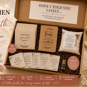 May include: A gift box containing ten 'Open When' faith letters, five scripture cards, a journal with the text 'I will fear no evil for my God is with me', a small prayer quilt, and a mustard seed keepsake. The box lid features the text 'Have I told you lately... you are loved, you are seen, you are never alone.'