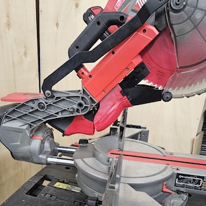Milwaukee miter saw dust collector adapter.