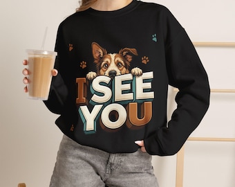 Sudadera con estampado de perro asomándose y huella de pata