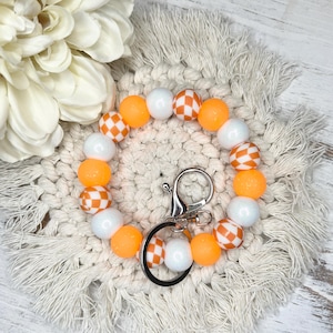 Pulsera Vols / Pulseras llavero / Pulsera naranja y blanca, pulsera a cuadros naranja / Pulseras de silicona / Llavero de silicona / Para ella regalo