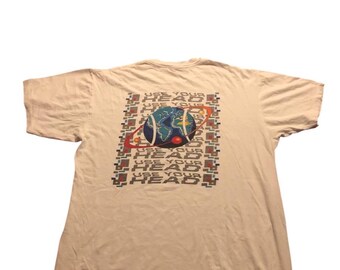 Camiseta vintage de los 90 con el lema "Usa la cabeza" (tallas S/XL)
