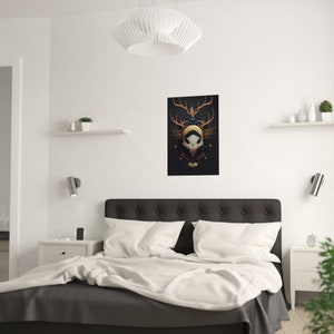 May include: A black and gold skull with antlers and floral accents on a dark background. The skull is surrounded by a circle of stars and a crescent moon.