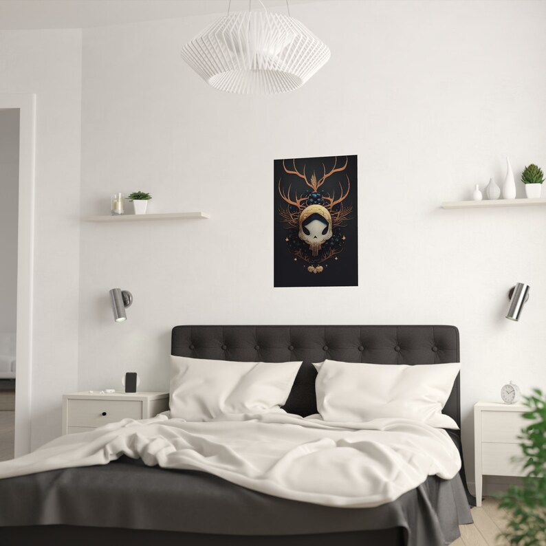 May include: A black and gold skull with antlers and floral accents on a dark background. The skull is surrounded by a circle of stars and a crescent moon.