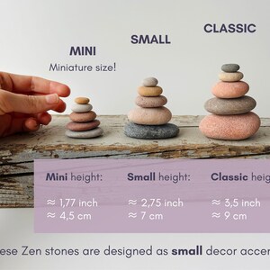 May include: Three stacks of smooth, rounded stones labeled Mini, Small, and Classic. The Mini stack is 1.77 inches tall, the Small stack is 2.75 inches tall, and the Classic stack is 3.5 inches tall. The stones are various shades of gray, tan, and pink.