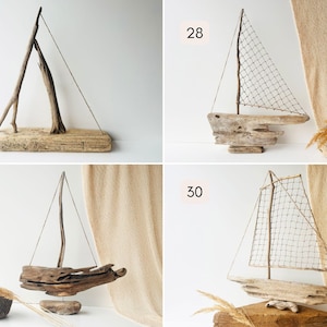 Puede incluir: Esculturas de veleros de madera flotante. Cada escultura presenta un dise&ntilde;o &uacute;nico con elementos de madera natural, incluyendo una base, m&aacute;stil y vela de madera. Las velas son de madera o red. Decoraciones n&aacute;uticas para la decoraci&oacute;n costera.