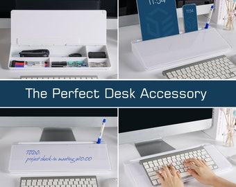 May include: White desk organiser with compartments for pens, pencils, and other office supplies. The organiser has a white dry erase board on top with the text "TODO: project check-in meeting@10:00".