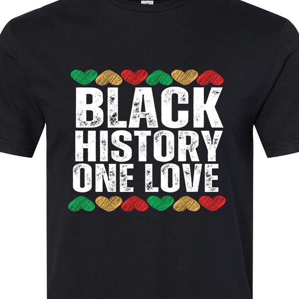 Black History One Love T-Shirt with a vibrant heart in red, green,and gold, symbolizing unity, resilience, and heritage.