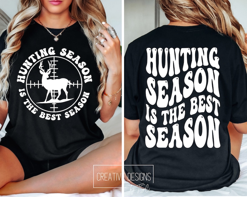 May include: Black t-shirt with the text "HUNTING SEASON IS THE BEST SEASON" in white. The front of the shirt features a white deer silhouette inside a scope. The back of the shirt has the same text in a wavy font.