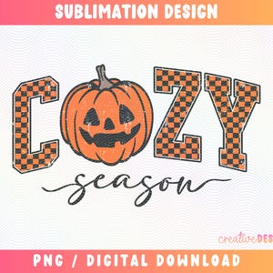 May include: A sublimation design featuring the text COZY with a black and orange checkered pattern, where the letter O is replaced by a carved orange pumpkin. Below, the word season is written in a black cursive script font.