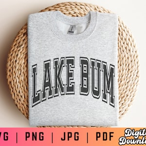 May include: Gray sweatshirt with the text "LAKE BUM" in black block letters.