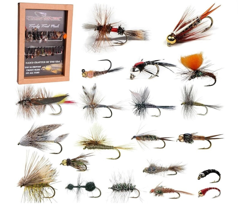 May include: A set of 20 hand-crafted fly fishing lures in a wooden box. The box has the text "Trophy Trout Pack" and "Hand Crafted in the USA". The lures are a variety of colors and styles.