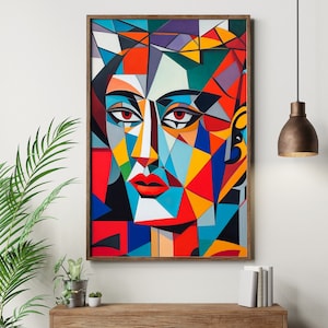 May include: Abstract portrait art print featuring a face composed of geometric shapes in vibrant colors. The artwork includes red lips and eyes, set against a background of blue, yellow, orange, and green. The print is framed in a dark wood.