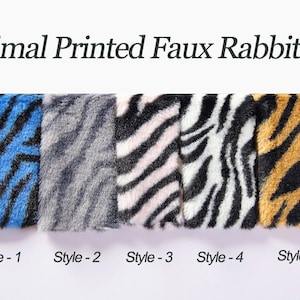May include: Five swatches of faux rabbit fur fabric with different animal prints. The swatches are arranged from left to right: blue and black zebra print, gray and black zebra print, pink and black zebra print, black and white zebra print, and orange and black tiger print.