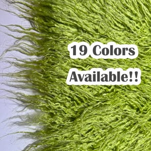 May include: A close-up of a bright green fluffy fabric. The fabric is soft and plush, with a long pile. The text "19 Colors Available!!" is printed on the fabric.