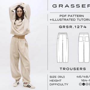 Pode incluir: Um fato de treino bege composto por um moletom curto e calças de treino a condizer. A imagem também inclui um gráfico com o texto "GRASSER PDF PATTERN + ILLUSTRATED TUTORIAL GRSR.1274 TROUSERS". O tamanho é 46/48/50 e a altura é 164-170 cm.