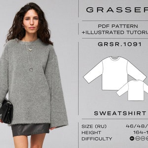 Op de afbeelding: Een vrouw draagt een grijze oversized sweatshirt met wijde mouwen en een zwarte rok. De afbeelding bevat een diagram van het sweatshirtpatroon, de tekst "GRASSER", "PDF PATTERN + ILLUSTRATED TUTORIAL" en "SWEATSHIRT". Het patroon is maat 46/48/50.