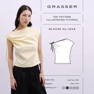 Puede incluir: Una mujer con una blusa amarilla pálido de un solo hombro con detalles de tela fruncida y cierre de lazo. La blusa se combina con pantalones negros. La imagen incluye texto: GRASSER, PDF PATTERN + ILLUSTRATED TUTORIAL, BLOUSE No.1245.