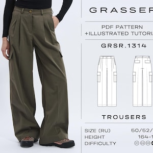 Puede incluir: Una taza de cerámica blanca con un diseño floral colorido. La taza tiene un asa y un borde ancho. Las flores son en tonos de rosa, morado y amarillo. La taza es probablemente para bebidas calientes.