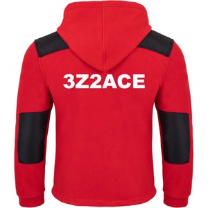 May include: Red fleece hoodie with black accents on the shoulders and sleeves. The hoodie has a white text print on the back that says "3Z2ACE".