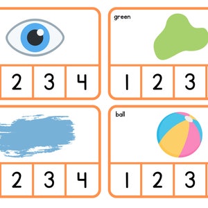 May include: Four flashcards with orange borders. The cards display an eye, a green blob, a blue brushstroke, and a beach ball. Each card has the word for the image and the numbers 1-4 below. Educational flashcards for learning.