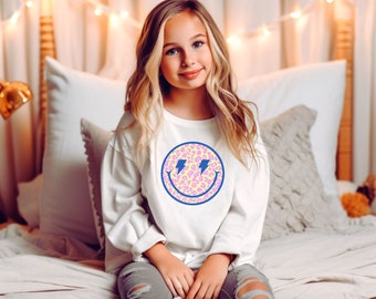 スマイリーフェイス ヒョウ柄 稲妻 ユース スウェットシャツ、スマイリーフェイス クルーネック スウェットシャツ、ライトブルー スマイリーフェイス スウェットシャツ、Y2K 服