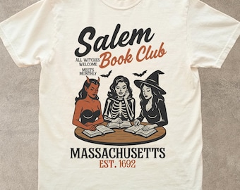 魔女の読書クラブのハロウィンTシャツ、不気味な女の子の読書Tシャツ、レトログラフィックハロウィンTシャツ、魔女のセーラムTシャツ、ハロウィンレディースTシャツ