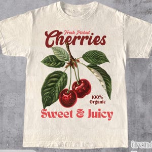 レトロチェリーコマーシャルグラフィックシャツ、ヴィンテージチェリーTシャツ、ユニセックスコットンTシャツ、y2kスタイルTシャツ、彼と彼女への素敵なギフト