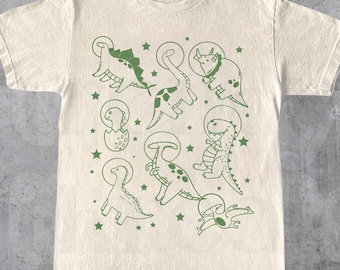Koszulka z dinozaurami w kosmosie, zabawna koszulka z dinozaurem astronautą, koszulka z grafiką retro science fiction, koszulka vintage z kosmosem, koszulka unisex z humorem, fajny prezent dla niego i dla niej