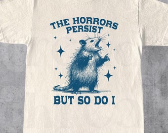 The Horrors Persist But So Do I Shirt, Retro Opossum Shirt, Sarcastic Shirt, Funny Mental Health, Meme Shirt, Opossum Shirt,Funny Raccon Tee