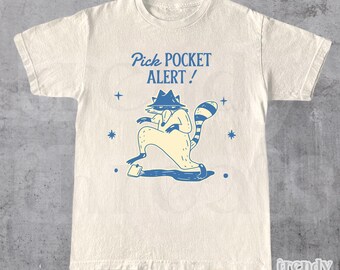 Pick Pocket Alert Raccoon T-Shirt | Funny Graphic Tee | Casual Unisex Shirt | Unique Gift for Animal Lovers